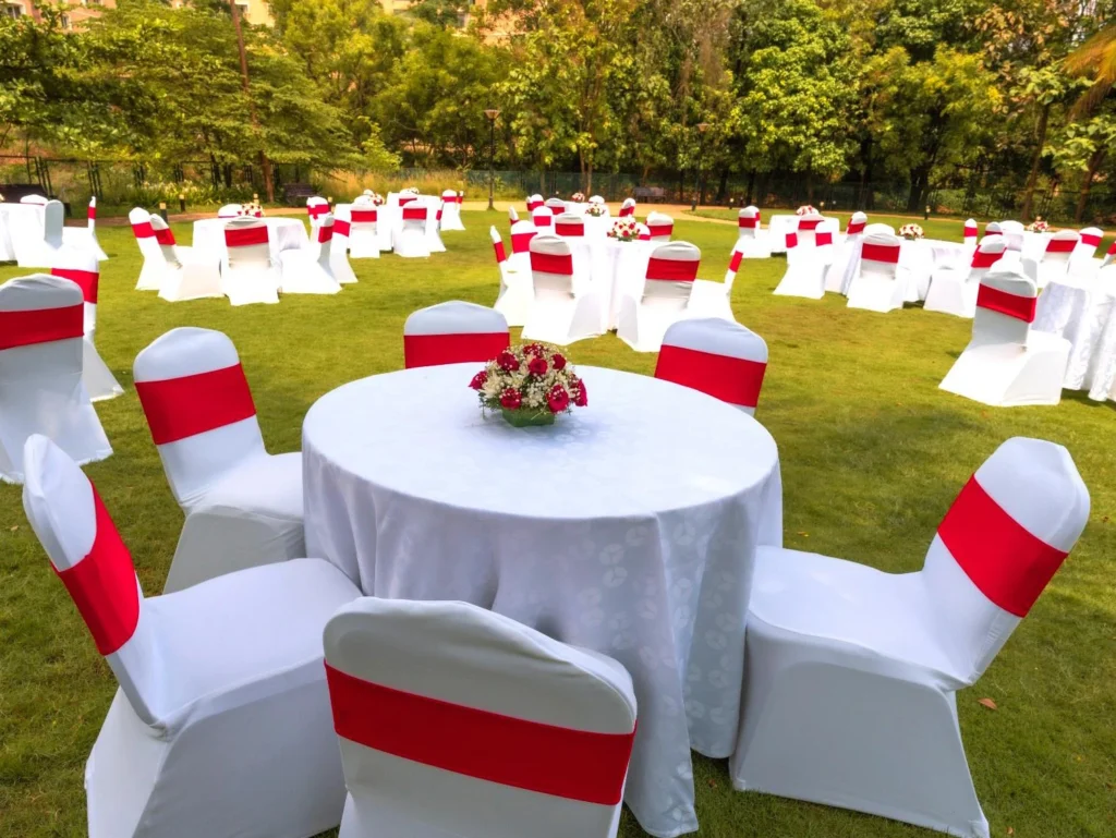 Signature Lawns at Signature Club Resort set with round tables
